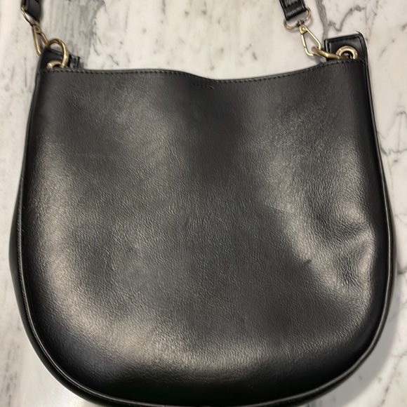 Black Anthropologie purse with gold hardware. One pocket inside. - Picture 6 of 6